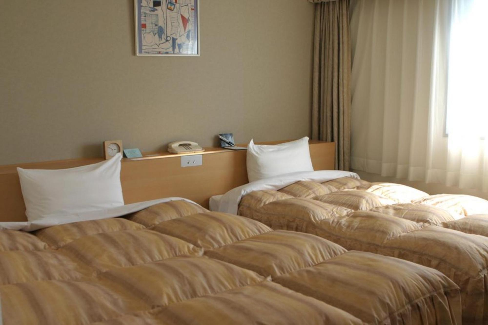 Okura Hotel Маругаме Экстерьер фото